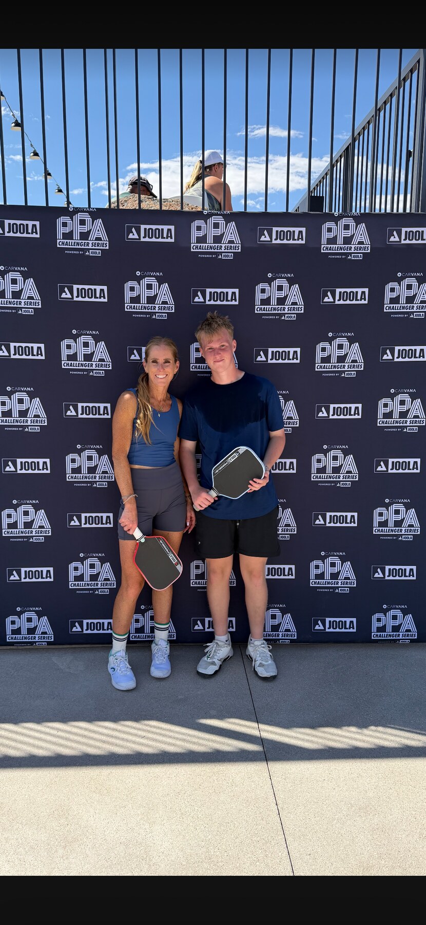 Coach Liz Boydston with a junior player at a PPA Challenger event